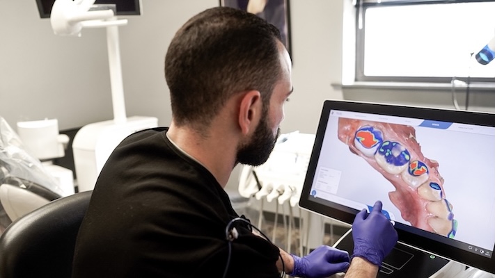 A team member working on the 3D x-ray.